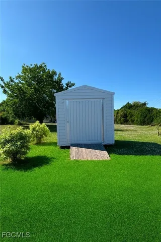 a view of a back yard of the house