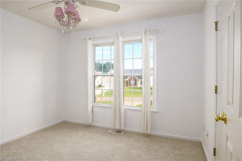 135 Winding Creek Road Mocksville, NC 27028 - Photo 18 of 32 3rd bedroom with new carpet and paint
