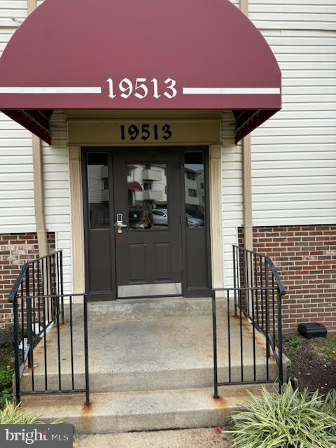 19513 Gunners Branch Road, Unit 514 Germantown, MD 20876 - Photo 2 of 42 a view of a wooden door