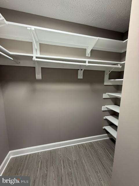 19513 Gunners Branch Road, Unit 514 Germantown, MD 20876 - Photo 23 of 42 a view of a room with racks on the wall