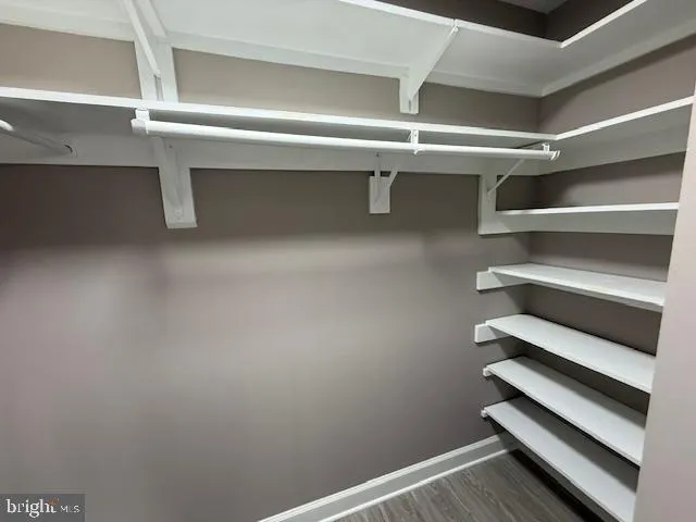 a view of room with racks on the wall