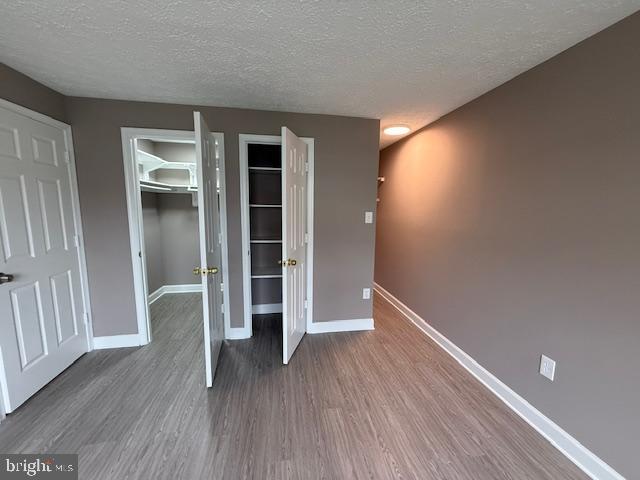 19513 Gunners Branch Road, Unit 514 Germantown, MD 20876 - Photo 28 of 42 wooden floor in an empty room with a window