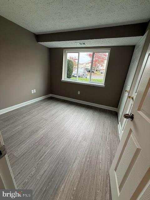 19513 Gunners Branch Road, Unit 514 Germantown, MD 20876 - Photo 38 of 42 wooden floor in an empty room with a window