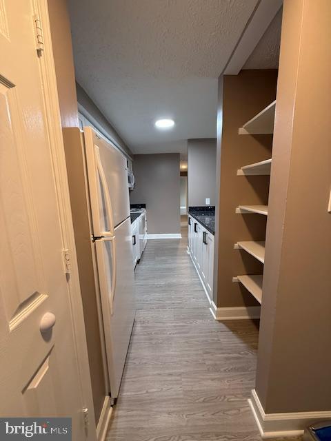19513 Gunners Branch Road, Unit 514 Germantown, MD 20876 - Photo 4 of 42 a view of walk in closet with empty racks
