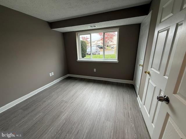 19513 Gunners Branch Road, Unit 514 Germantown, MD 20876 - Photo 41 of 42 wooden floor in an empty room with a window