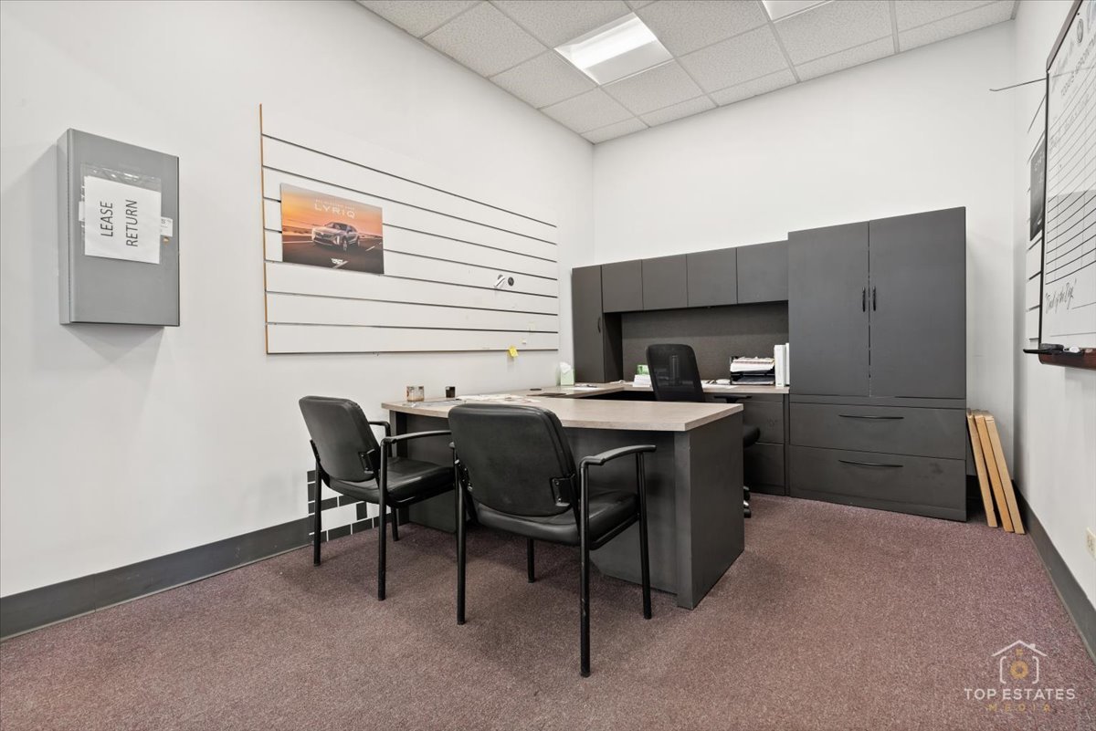 206 North Cook Street Barrington, IL 60010 - Photo 41 of 55 a kitchen with a table chairs and refrigerator