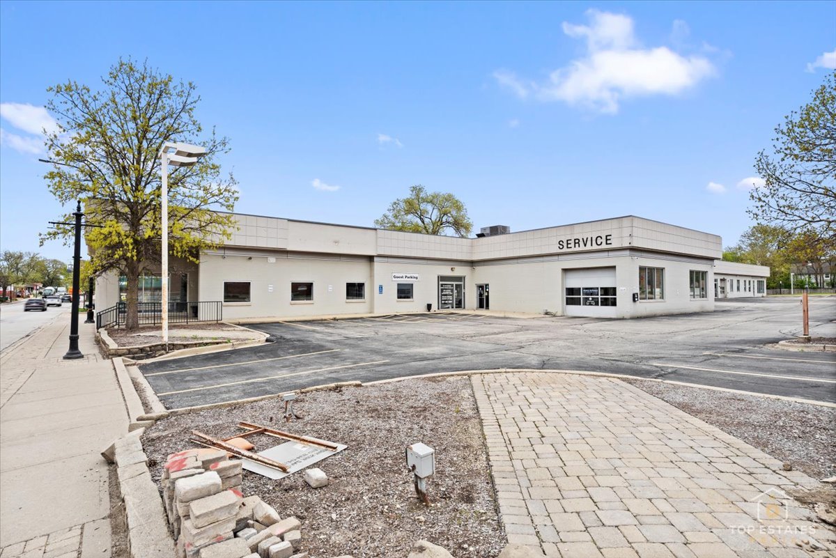 206 North Cook Street Barrington, IL 60010 - Photo 5 of 55 a front view of a house with a yard