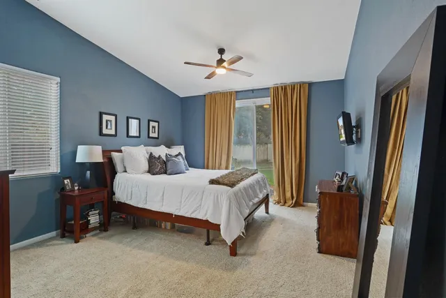 a room with gym equipment and windows