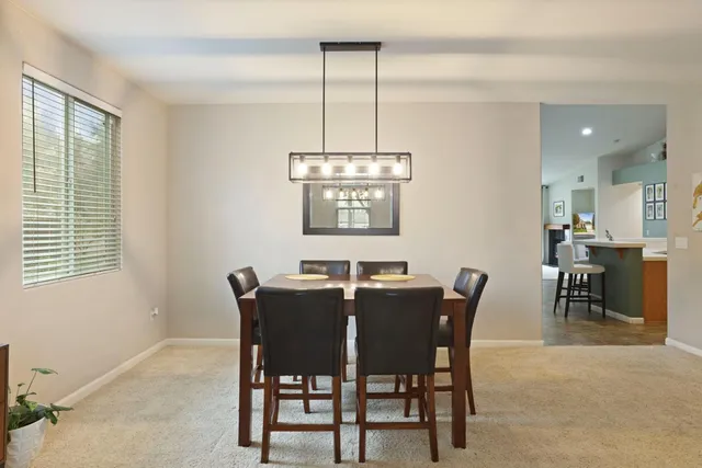 a room with furniture and a flat screen tv