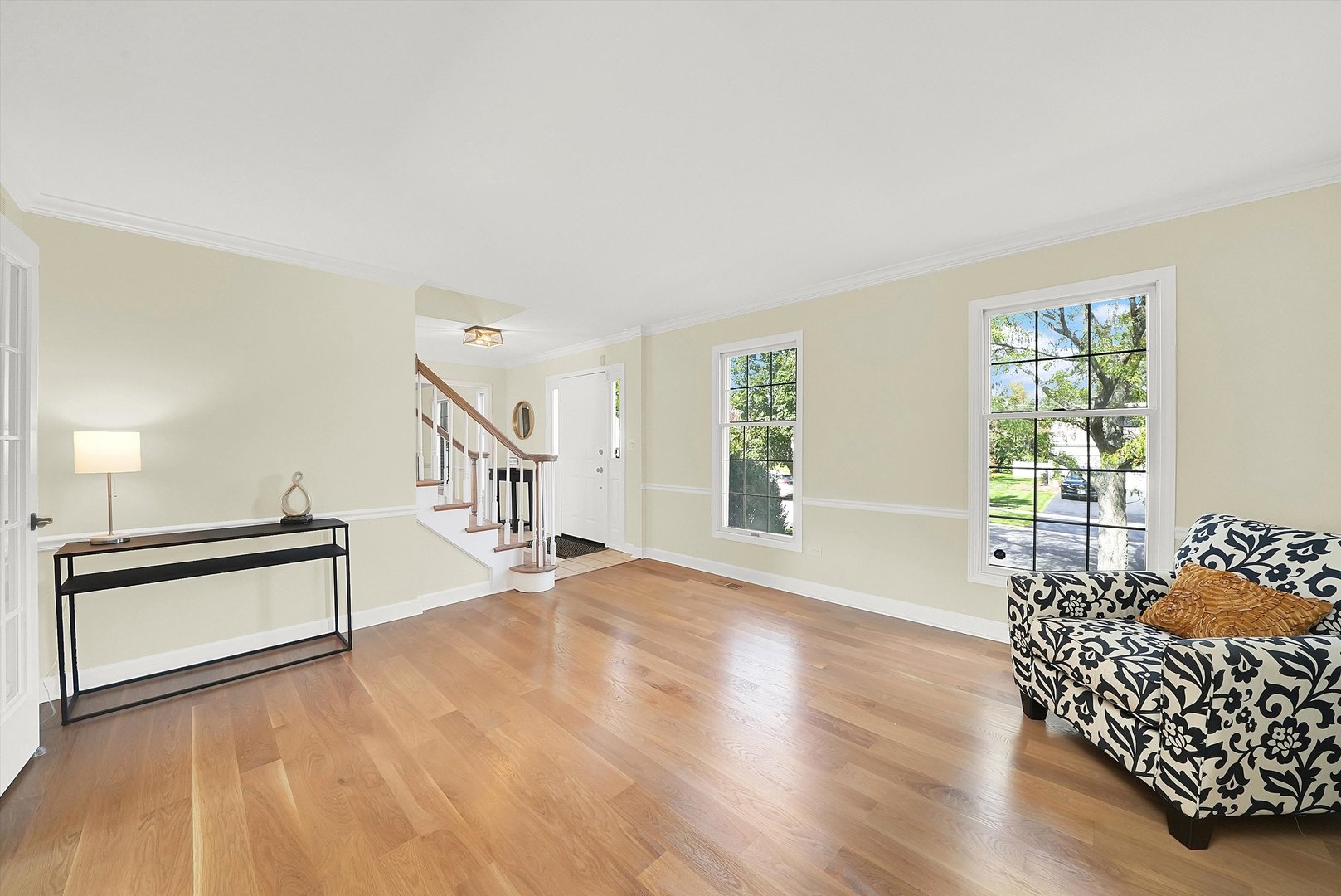 129 Sunset Ridge Road Willowbrook, IL 60527 - Photo 12 of 45 a living room with furniture and a wooden floor