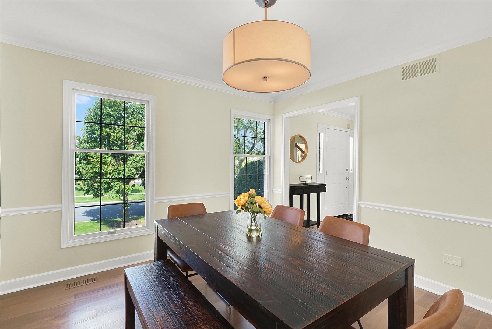 129 Sunset Ridge Road Willowbrook, IL 60527 - Photo 16 of 45 a view of a dining room with furniture window and wooden floor