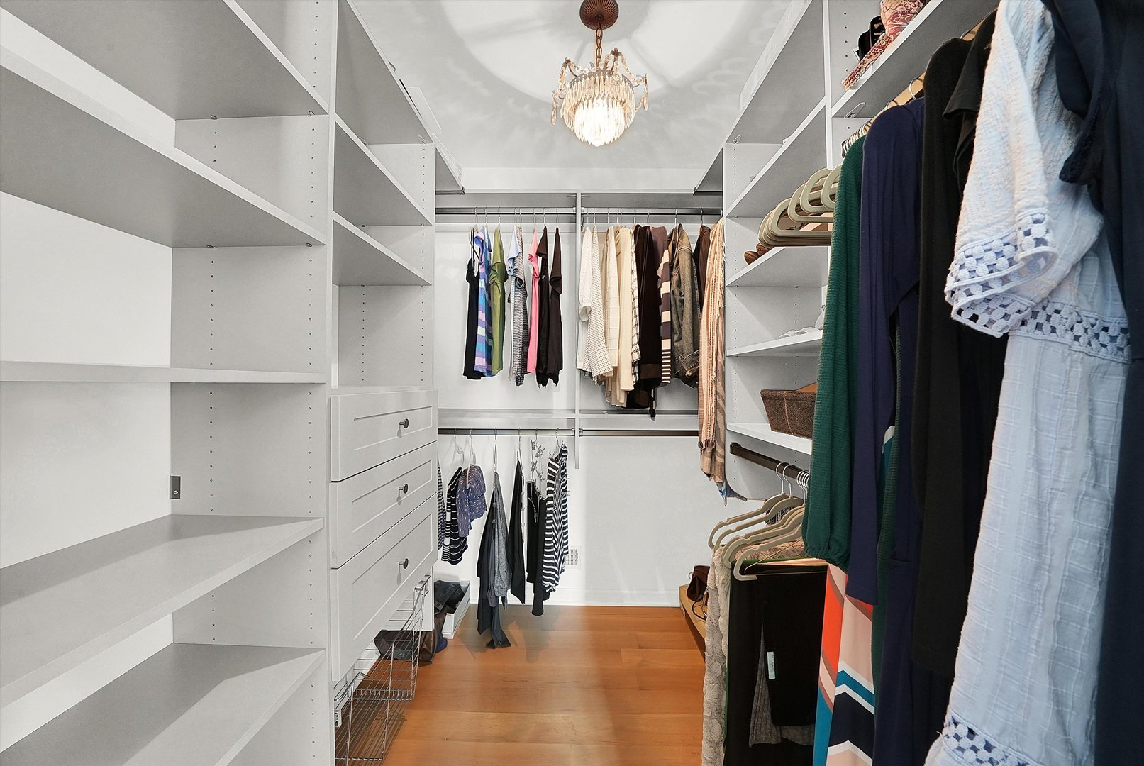 129 Sunset Ridge Road Willowbrook, IL 60527 - Photo 29 of 45 walk in closet with wooden floor and fan