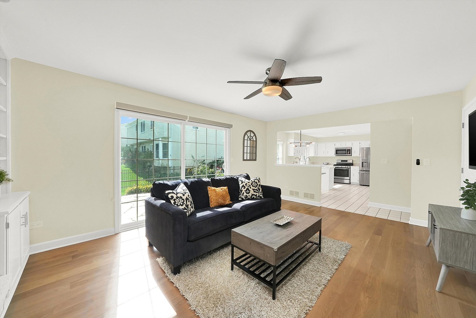129 Sunset Ridge Road Willowbrook, IL 60527 - Photo 9 of 45 a living room with furniture and a large window