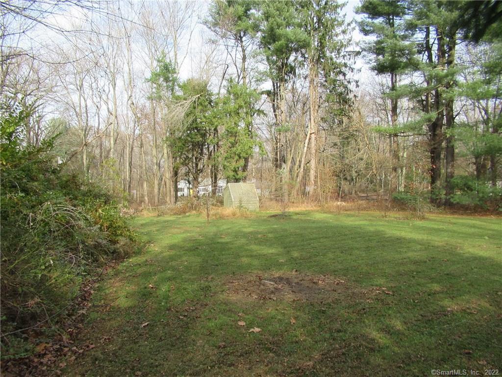 11 Burnt Swamp Road Woodbridge, CT 06525 - Photo 27 of 29 a view of outdoor space with trees all around