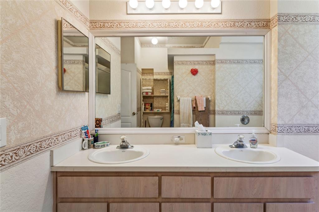 26861 Mondon Hill Road Brooksville, FL 34602 - Photo 21 of 51 a bathroom with a sink and a mirror