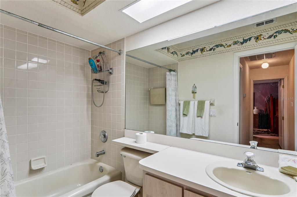 26861 Mondon Hill Road Brooksville, FL 34602 - Photo 25 of 51 a bathroom with a sink and a mirror