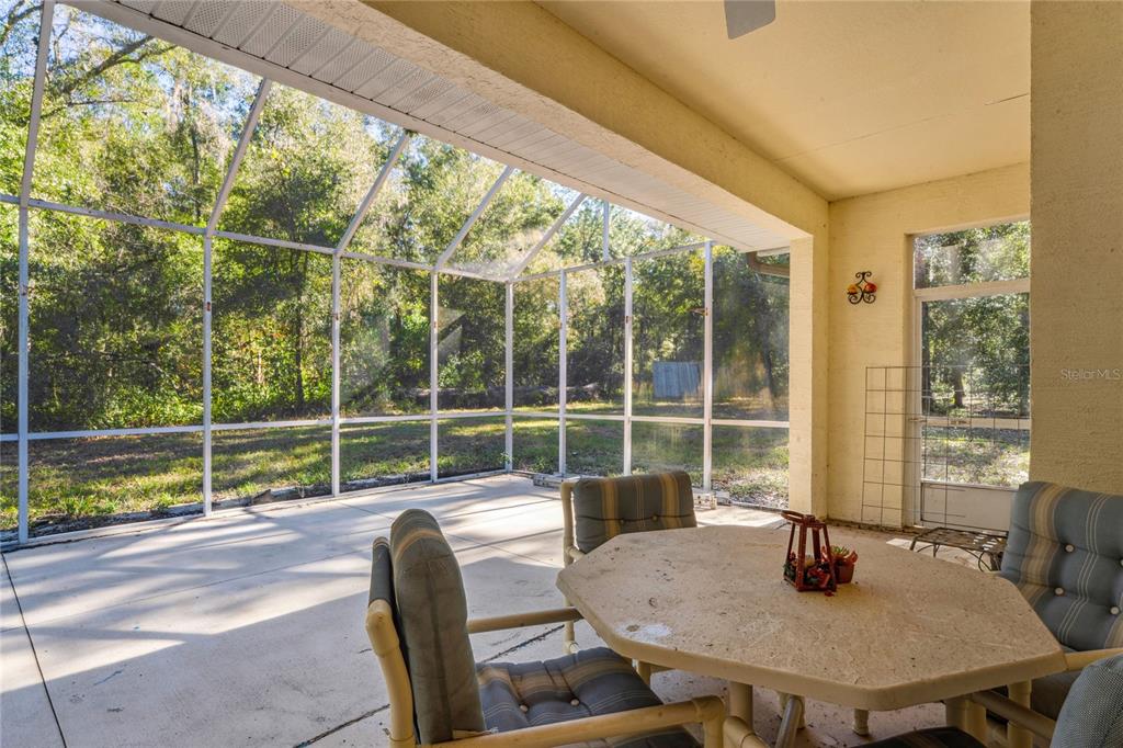 26861 Mondon Hill Road Brooksville, FL 34602 - Photo 29 of 51 a dining room with furniture and window