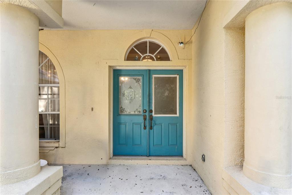 26861 Mondon Hill Road Brooksville, FL 34602 - Photo 3 of 51 a front door view of a house