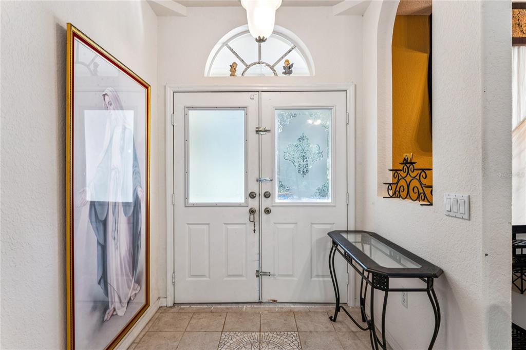 26861 Mondon Hill Road Brooksville, FL 34602 - Photo 4 of 51 wooden floor with a glass door