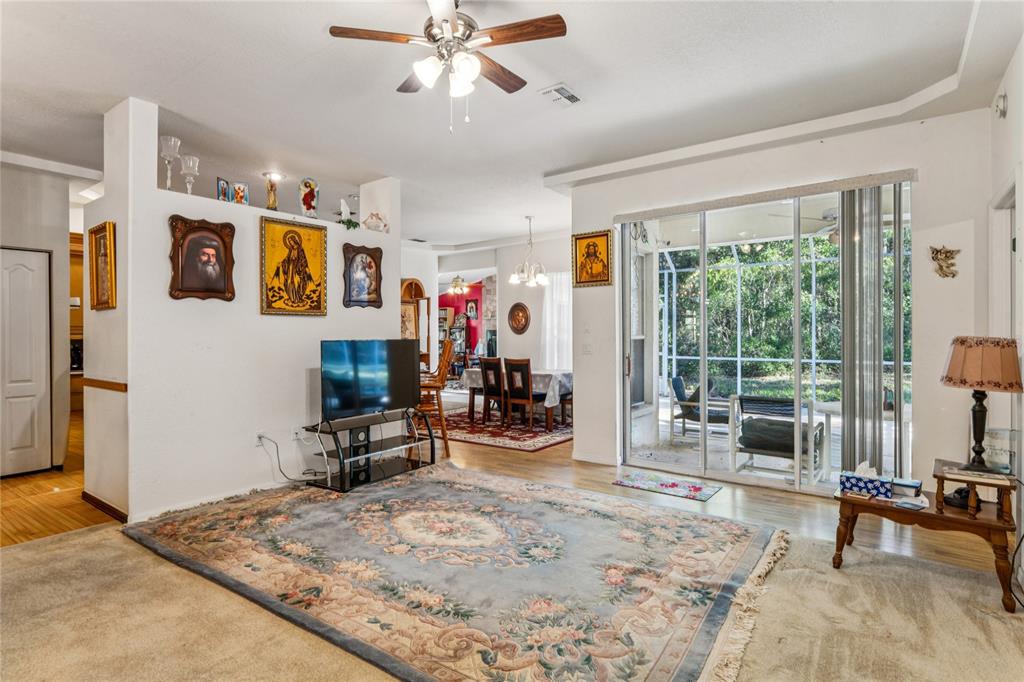 26861 Mondon Hill Road Brooksville, FL 34602 - Photo 5 of 51 a view of a livingroom with furniture window and outside view