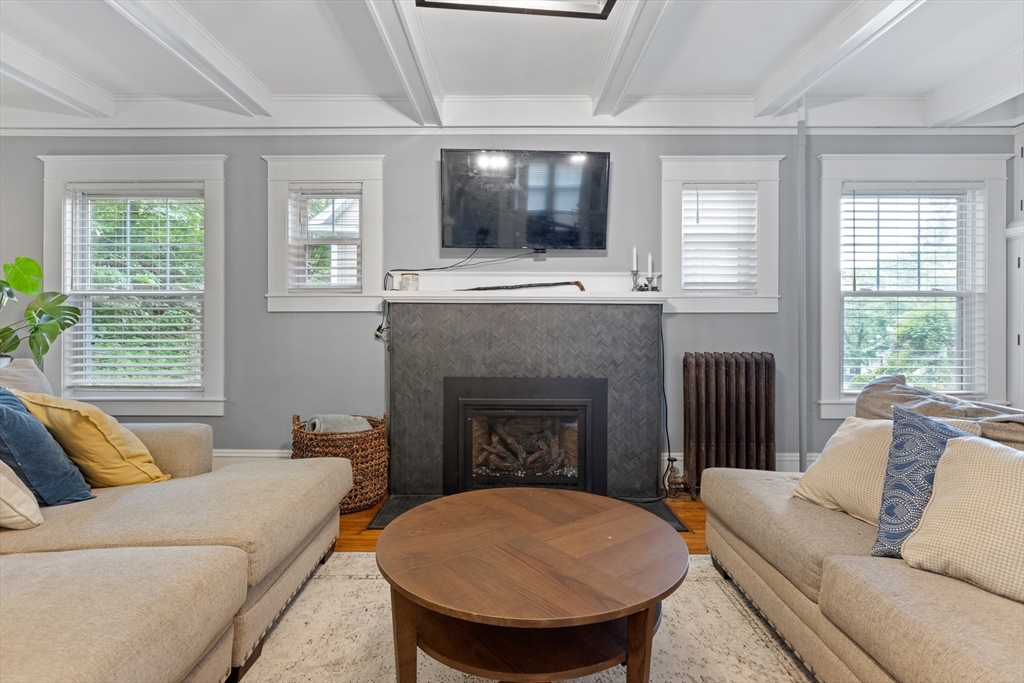 20 St Elmo Road Worcester, MA 01602 - Photo 8 of 40 a living room with furniture and a fireplace