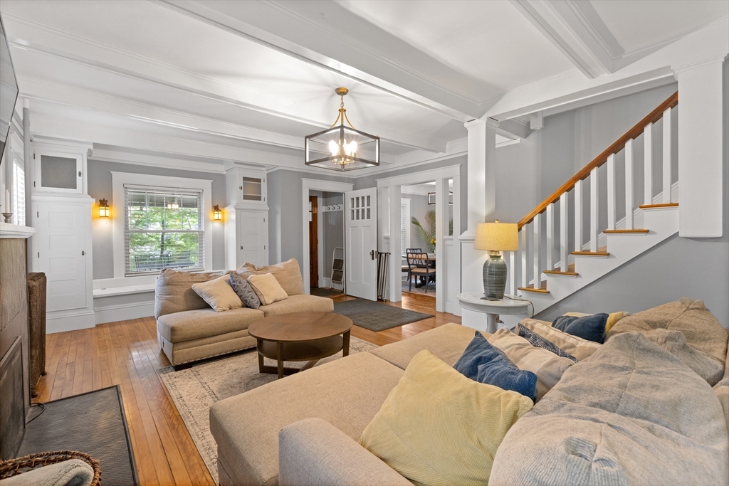 20 St Elmo Road Worcester, MA 01602 - Photo 10 of 40 a living room with furniture a chandelier and a dining table