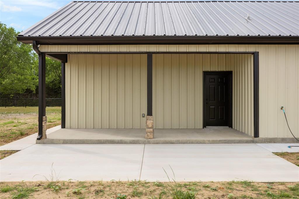 121 Brazier Road Ennis, TX 75119 - Photo 21 of 31 a backyard of a house