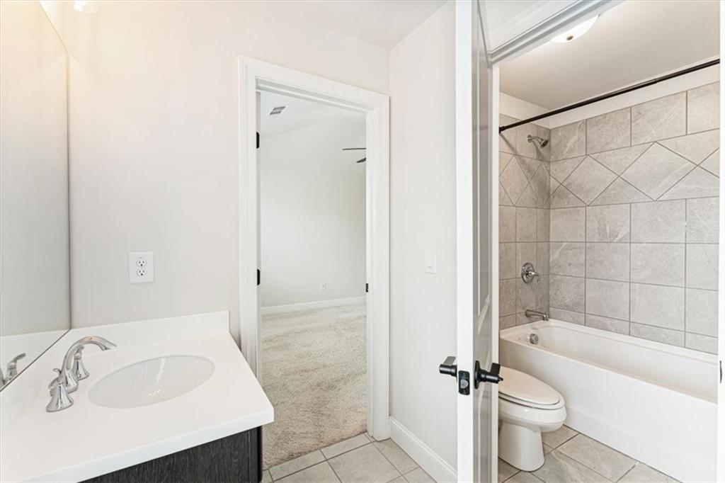 947 Hunter Way Milton, GA 30004 - Photo 63 of 78 a bathroom with a sink toilet and shower