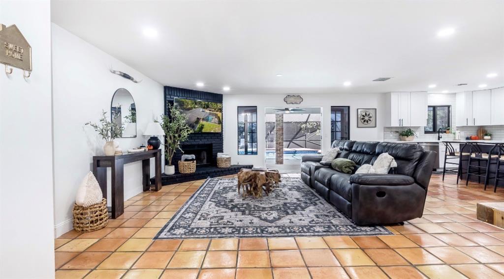 17191 38th Road North Loxahatchee, FL 33470 - Photo 13 of 60 a living room with furniture and a table