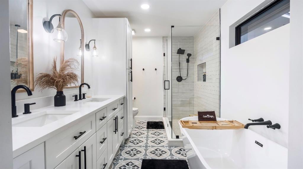 17191 38th Road North Loxahatchee, FL 33470 - Photo 23 of 60 a bathroom with a double vanity sink mirror double and shower