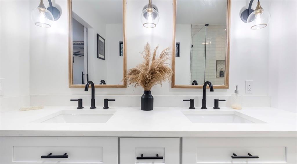 17191 38th Road North Loxahatchee, FL 33470 - Photo 25 of 60 a bathroom with double vanity sinks a vanity and a mirror