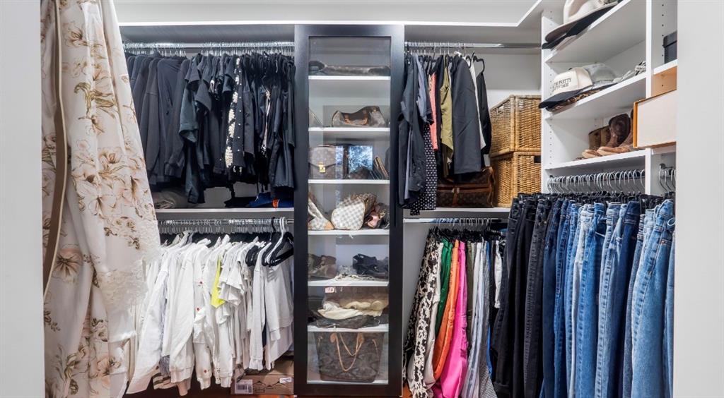 17191 38th Road North Loxahatchee, FL 33470 - Photo 27 of 60 a view of walk in closet with clothes