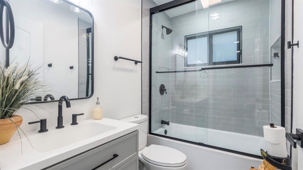 17191 38th Road North Loxahatchee, FL 33470 - Photo 32 of 60 a bathroom with a sink a toilet and shower