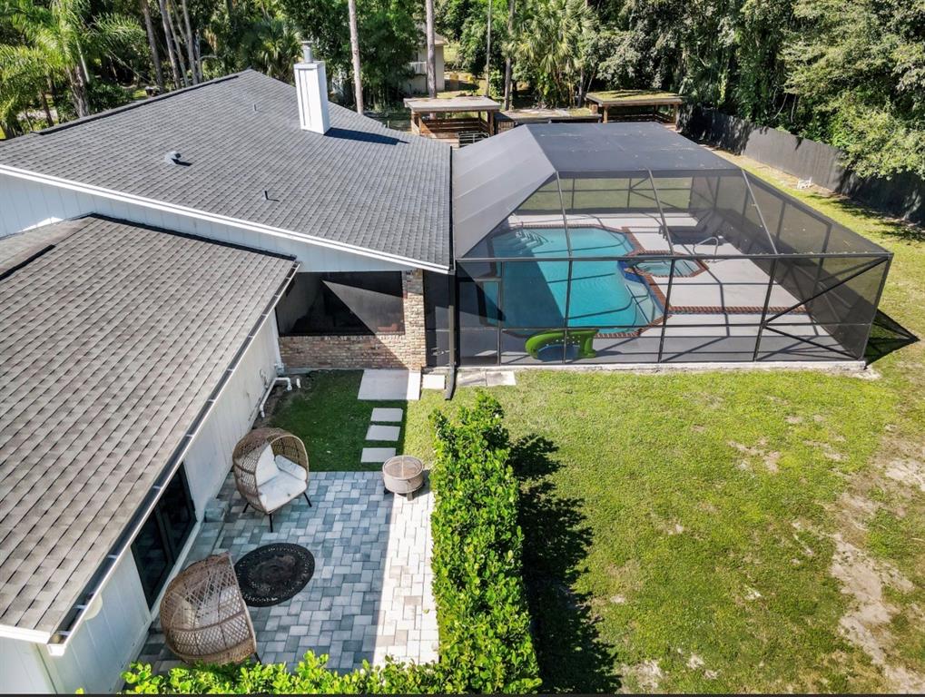 17191 38th Road North Loxahatchee, FL 33470 - Photo 44 of 60 a view of a back yard from a balcony