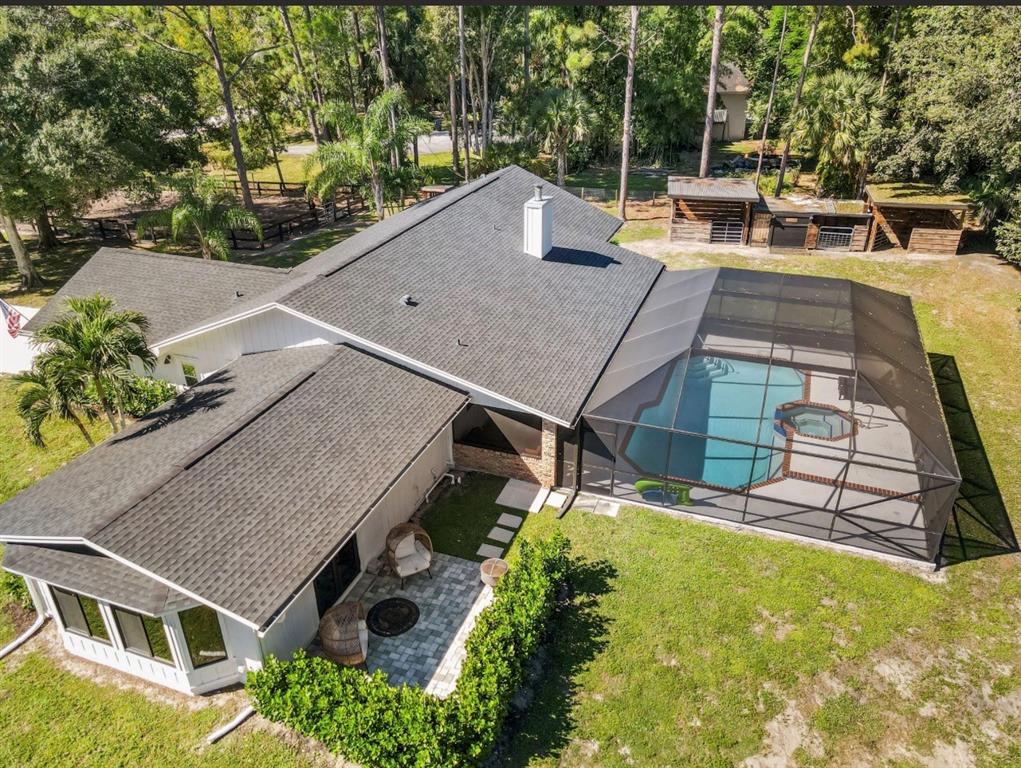 17191 38th Road North Loxahatchee, FL 33470 - Photo 51 of 60 an aerial view of a house with swimming pool