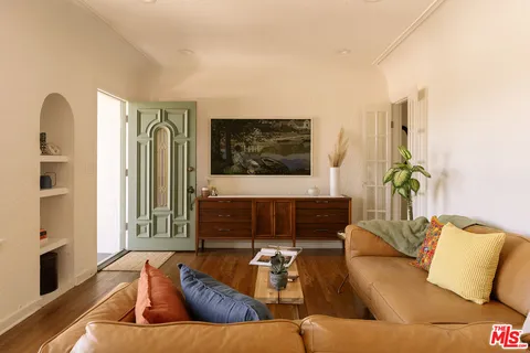 a living room with furniture and a couch