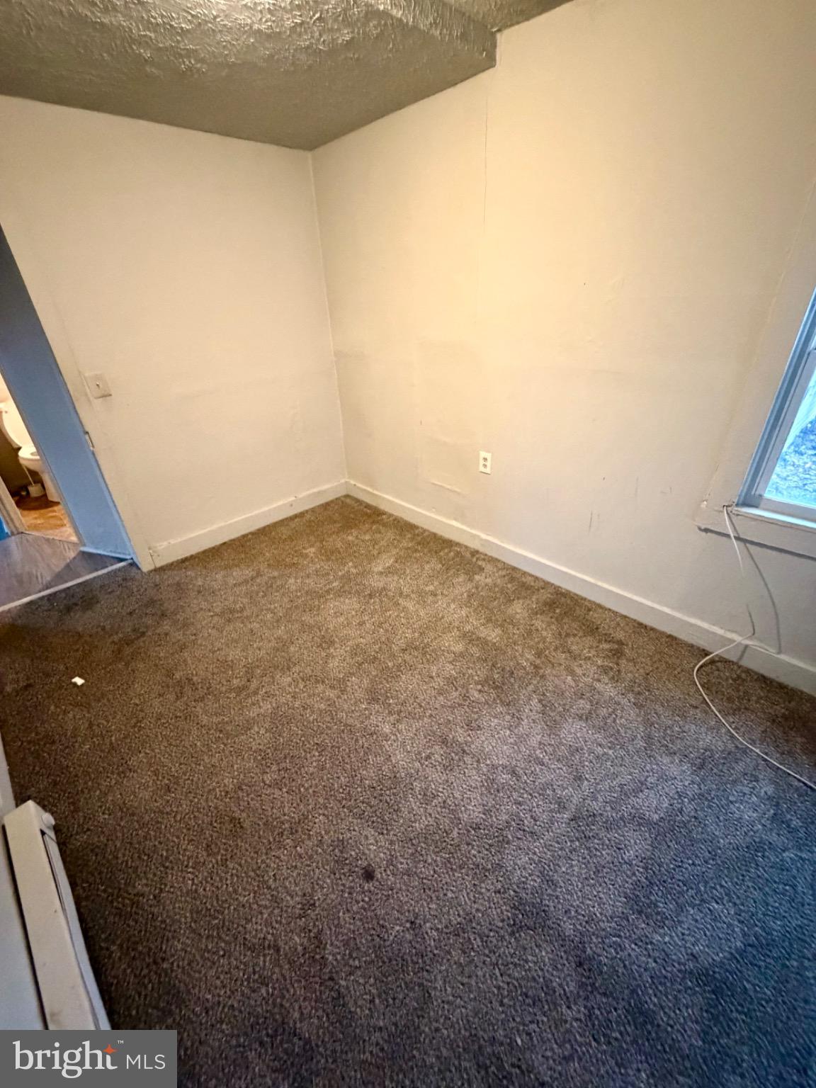 528 Fremont Street Winchester, VA 22601 - Photo 13 of 16 a view of empty room with wooden floor