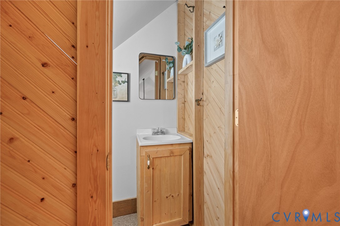 270 Little Cabin Road Amherst, VA 24521 - Photo 26 of 52 a view of a hallway with wooden cabinets and entryway
