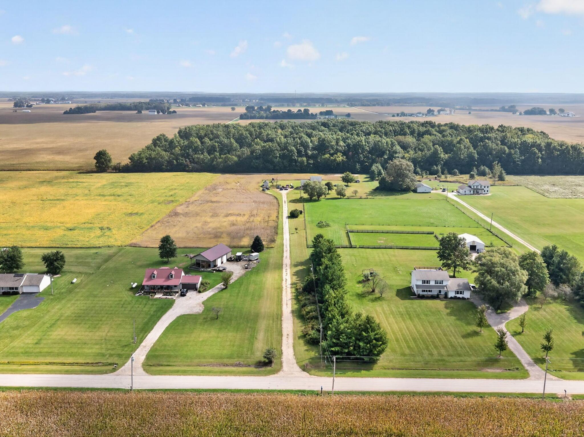 4780 North Section Line Road Radnor, OH 43066 - Photo 3 of 79 Rural setting with expansive agricultural fields, mature tree lines, and multiple residential structures