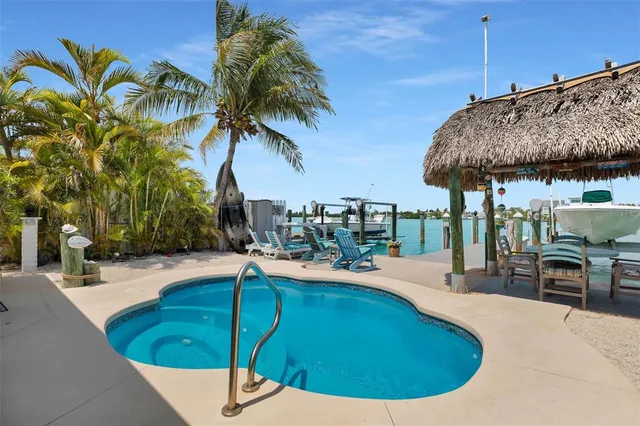 a view of a swimming pool with a patio