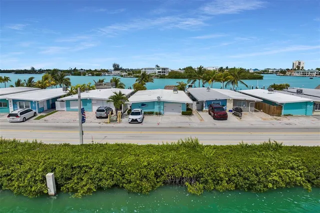 an aerial view of a city with seating area