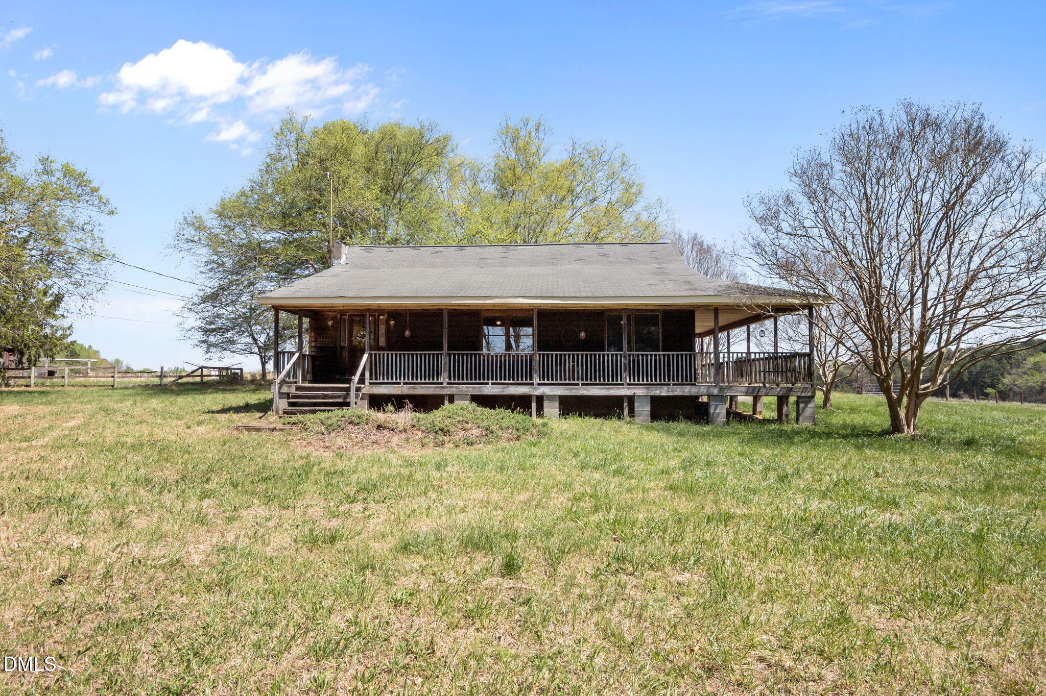 212 Thomas Humphries Road Roxboro, NC 27574 - Photo 43 of 56 a view of a house with a backyard