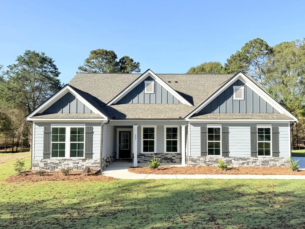 537 Elder Road Southeast Winder, GA 30680 - Photo 1 of 1 front view of a house with a yard