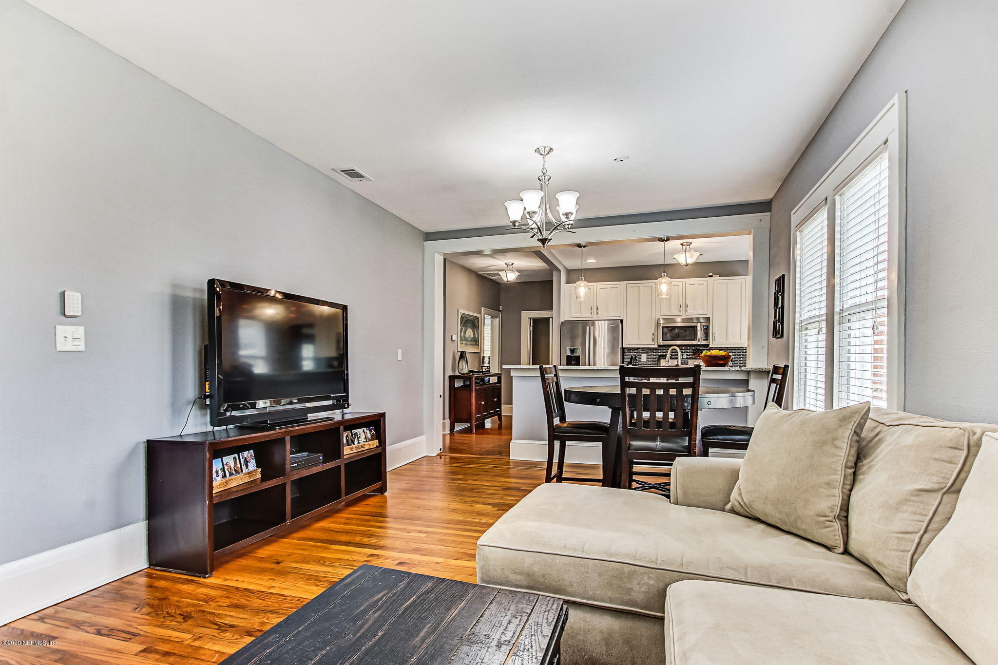 1292 Wolfe Street Jacksonville, FL 32205 - Photo 13 of 38 a living room with furniture and a flat screen tv