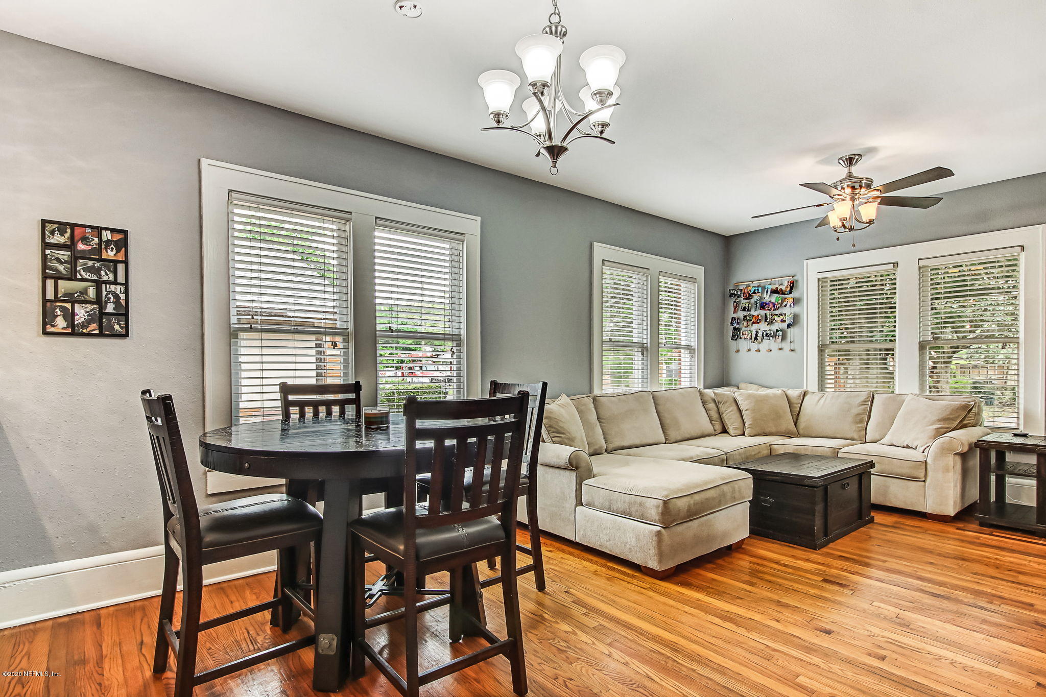 1292 Wolfe Street Jacksonville, FL 32205 - Photo 15 of 38 a living room with furniture dining table and a large window