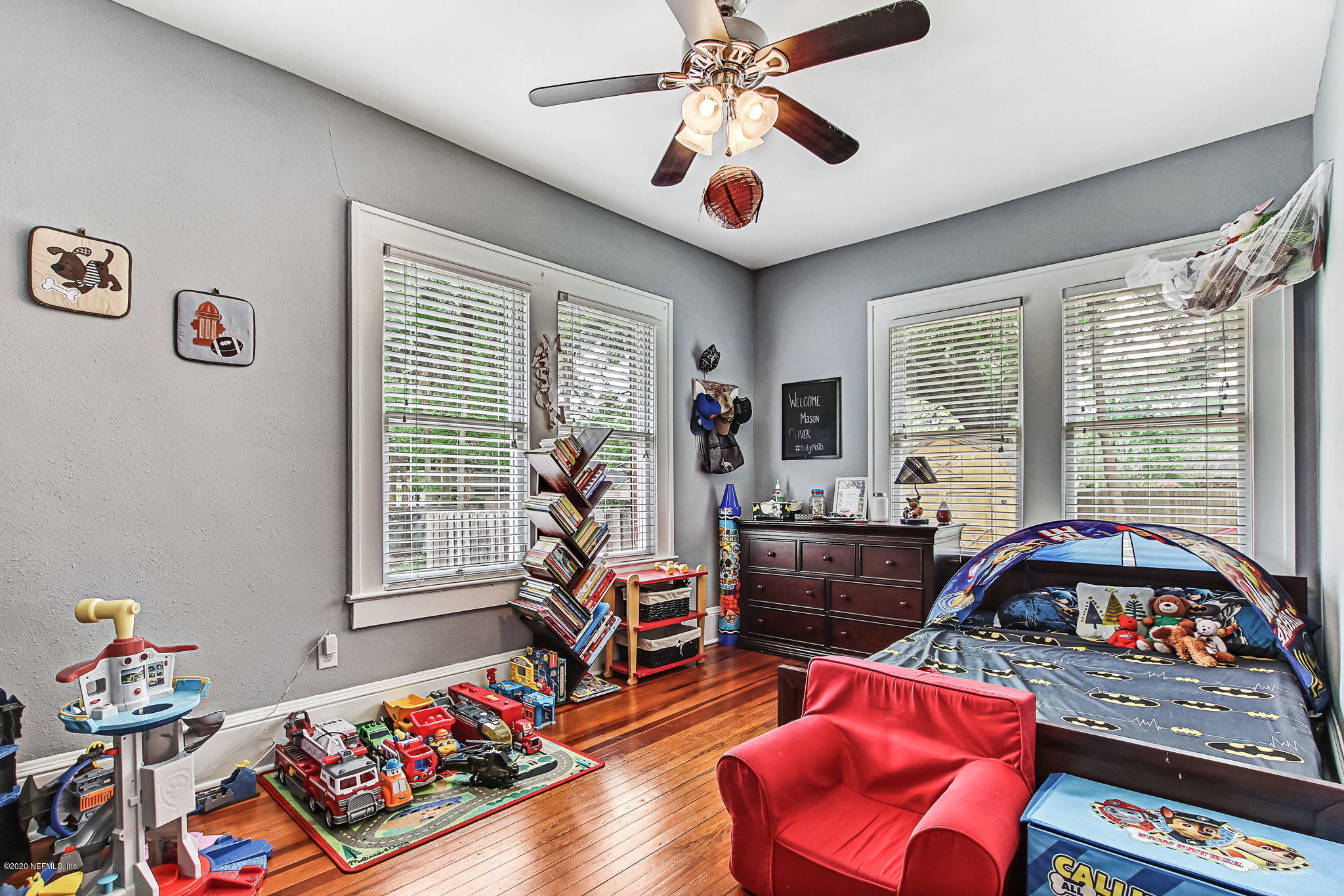 1292 Wolfe Street Jacksonville, FL 32205 - Photo 29 of 38 a bedroom with furniture and a large window