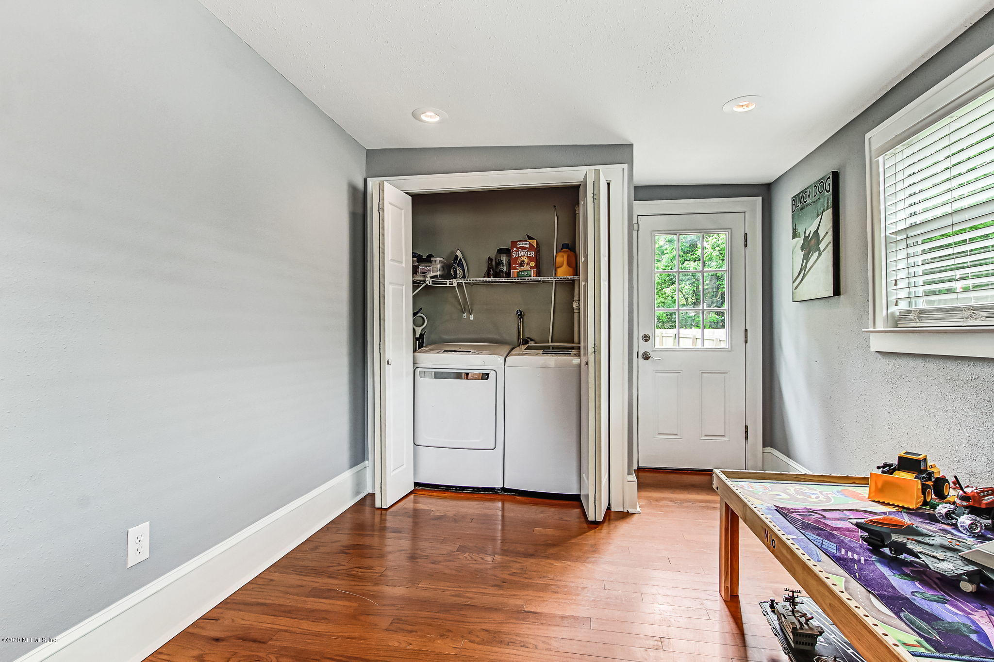 1292 Wolfe Street Jacksonville, FL 32205 - Photo 31 of 38 a view of a kitchen with a sink dishwasher and wooden floor