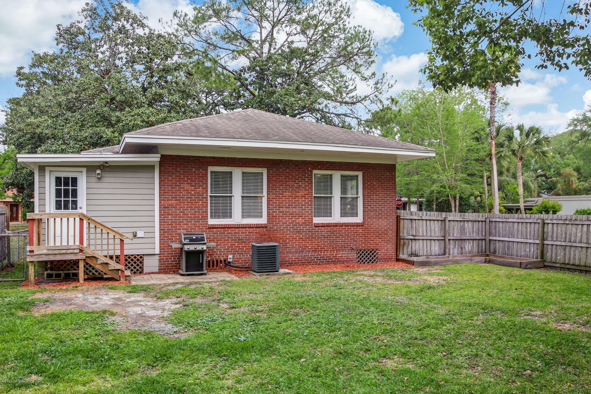 1292 Wolfe Street Jacksonville, FL 32205 - Photo 35 of 38 a front view of a house with a garden