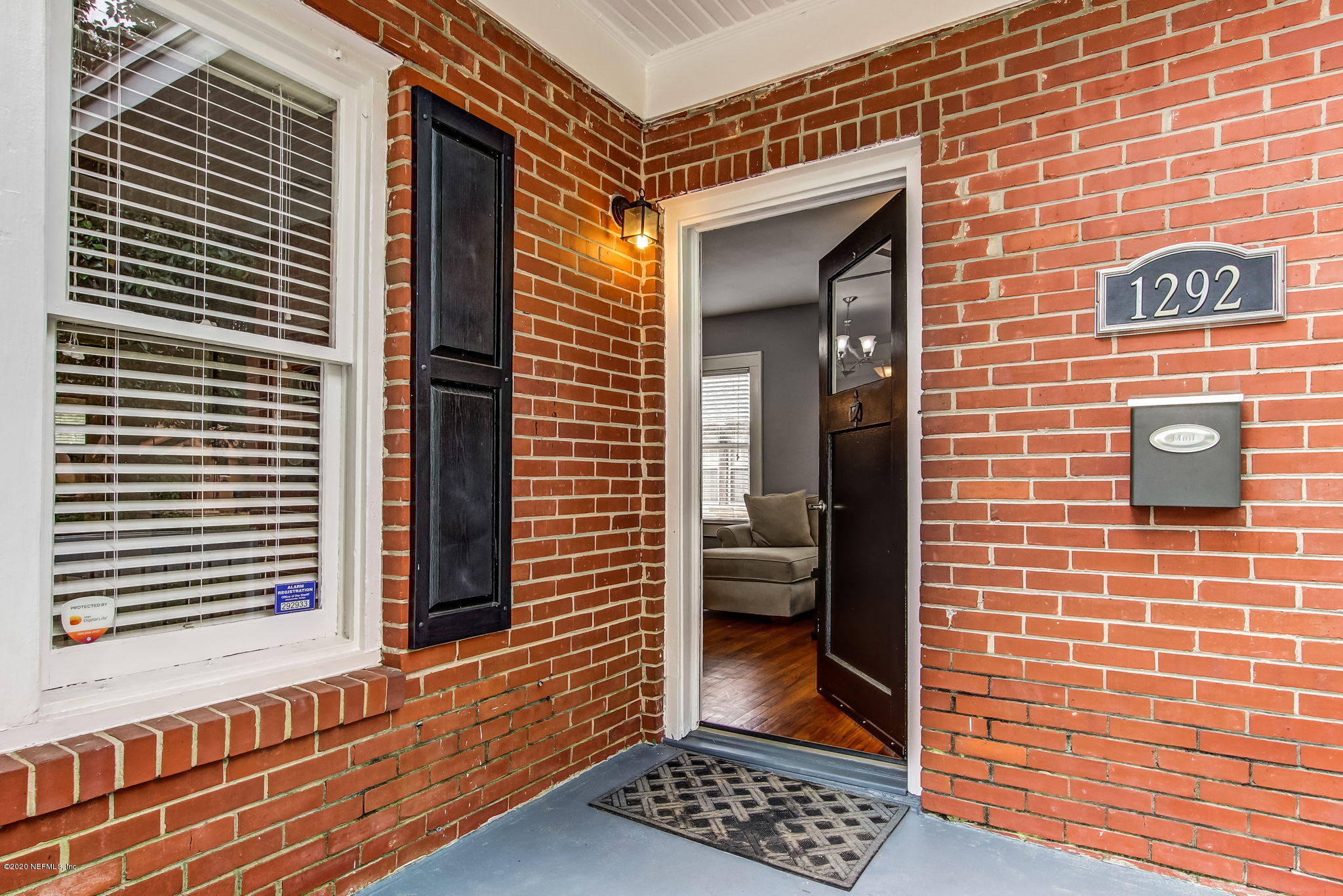 1292 Wolfe Street Jacksonville, FL 32205 - Photo 8 of 38 a view of a brick house with a door