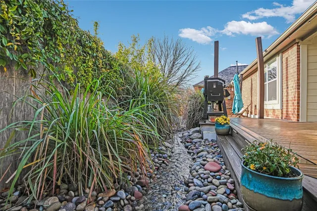 a view of a chairs and table on the deck